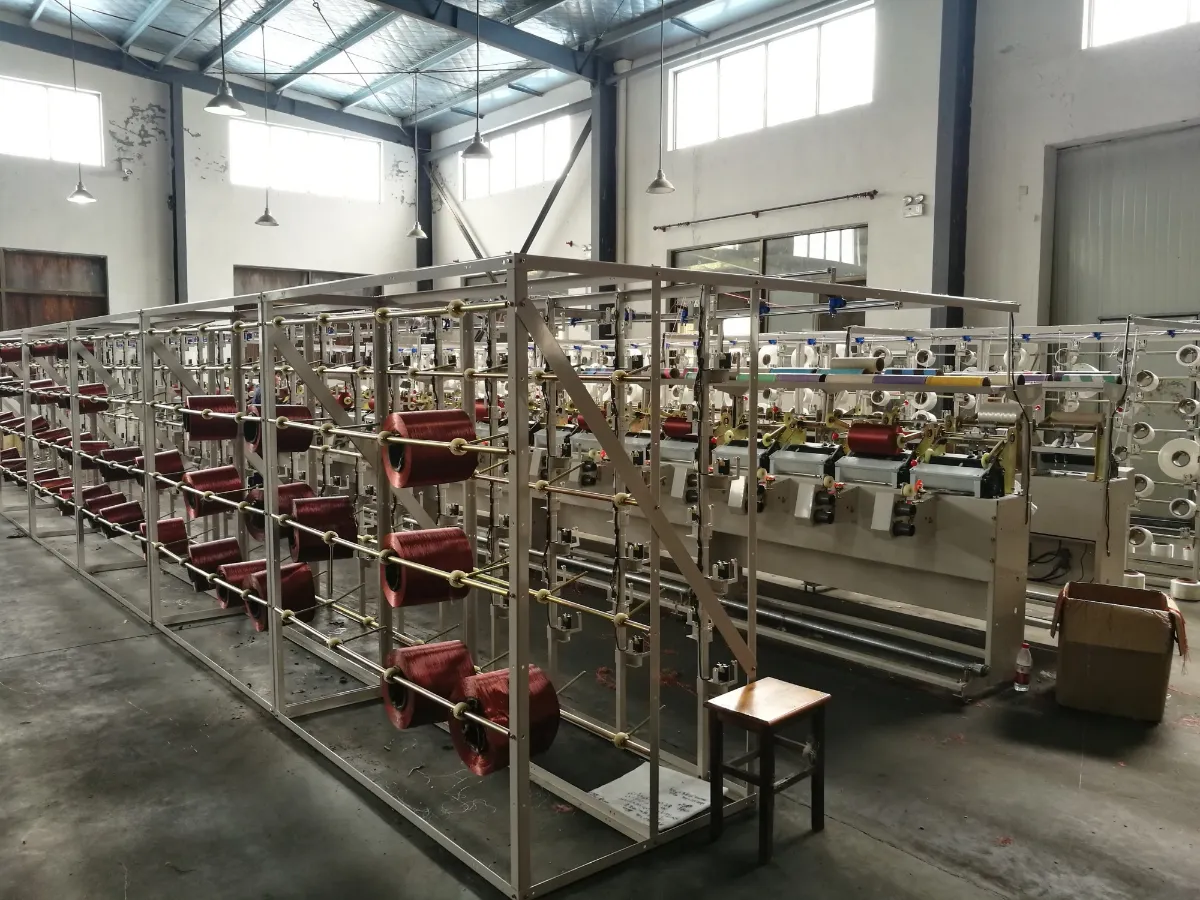 Twisting frames loaded with yarn bobbins