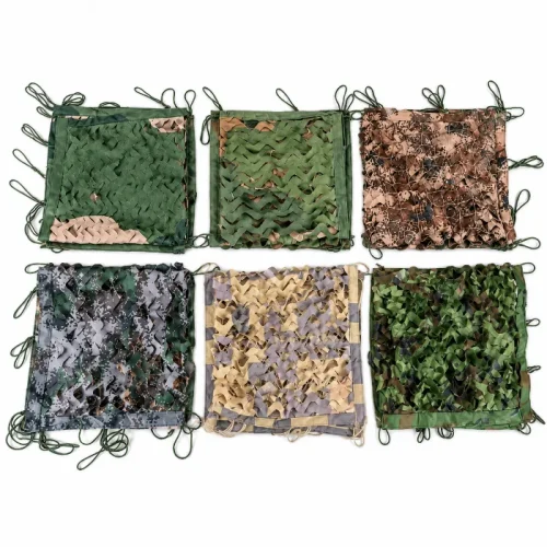 Six camouflage net samples in woodland and desert patterns